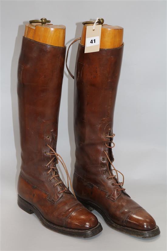 A pair of gentlemans tan leather riding boots, with stretchers